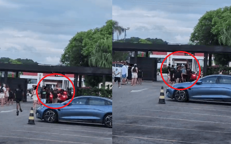 Porsche de luxo sendo cercado por homens em Jurerê Internacional