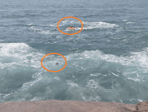 Homem caindo de pedra na praia do Gravatá