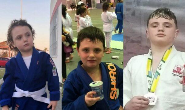 Arthur Farias Kretzzer no pódio com a medalha de ouro
